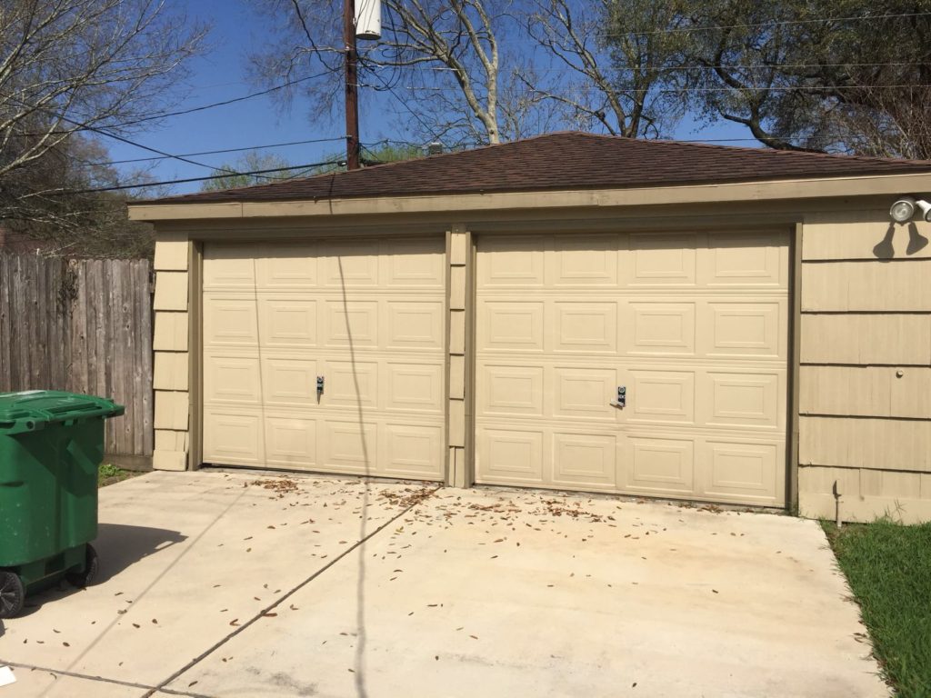 before- 2 garage door to 1 conversion